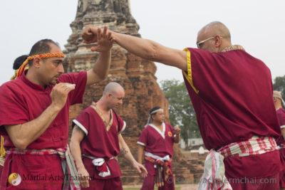 master training student in muay boran at ayutthaya temple