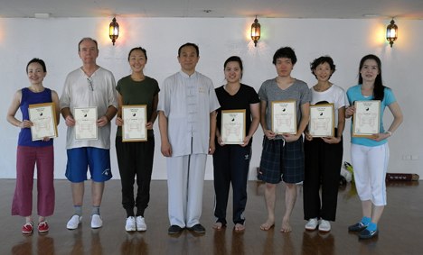 Chen taichi students formal group photo holding certificates