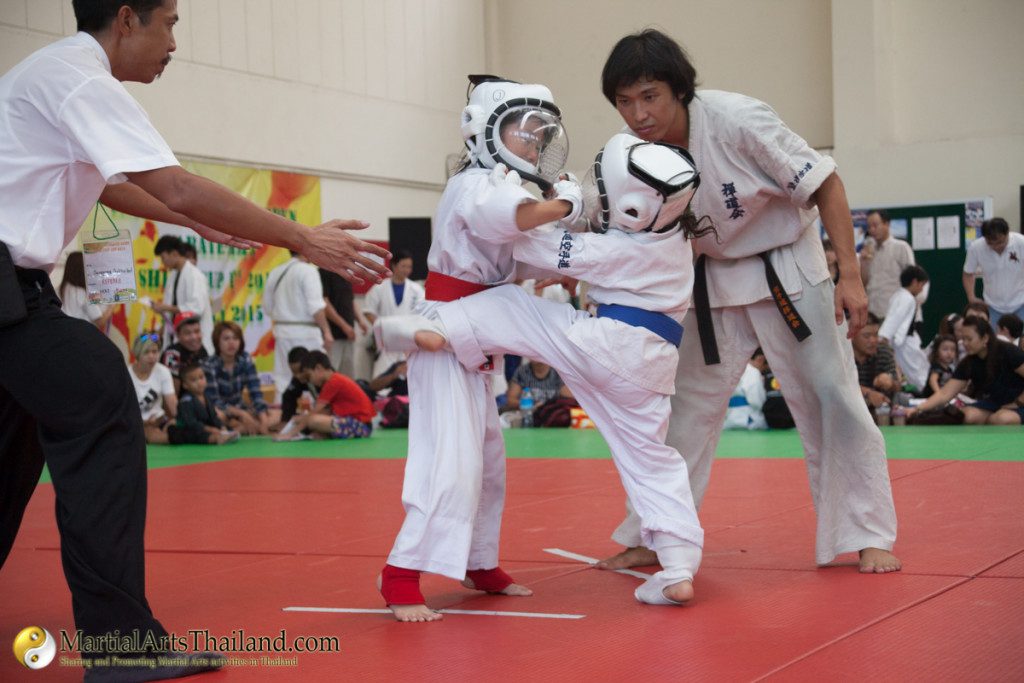 kids karate fight high kick