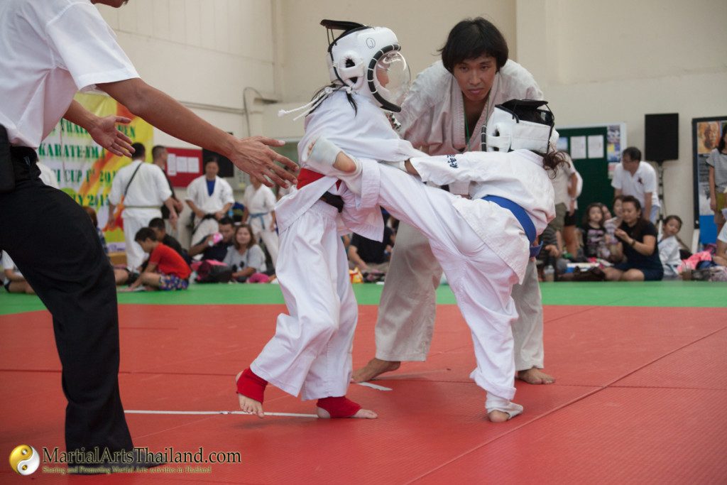kids karate fight high kick