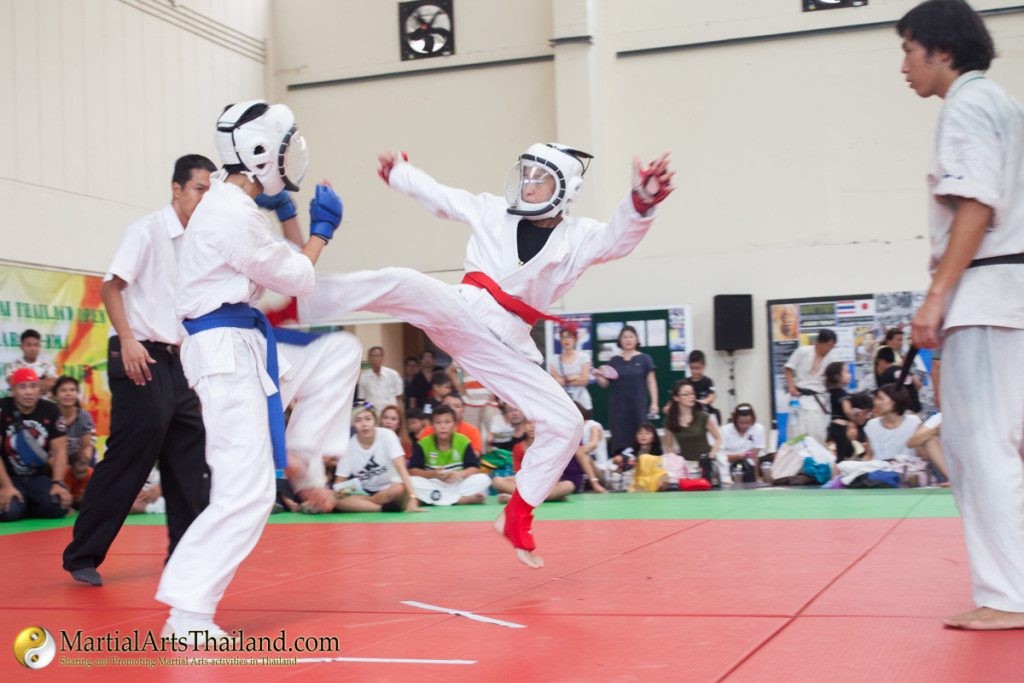 flying kick at karate competition