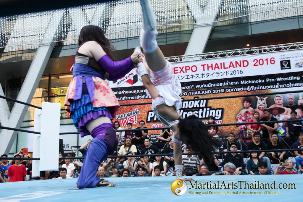 female fighter throwing opponent away at Pro-Wrestling Japan Expo 2016 Bangkok