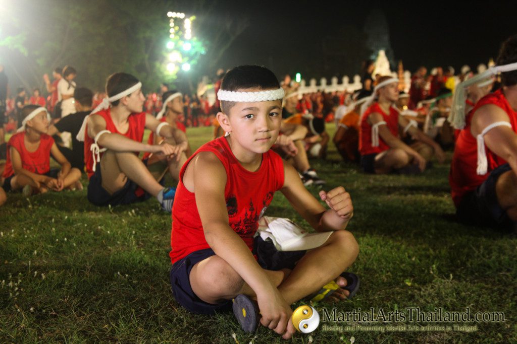 little boy posing at the 12th Wai Kru Muay Thai Ceremony 2016