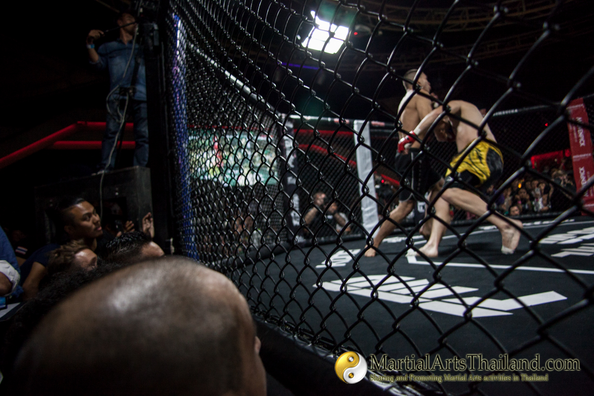Javier Trujillo fighting in the cage MMA at Full Metal Dojo 13 Concrete Jungle