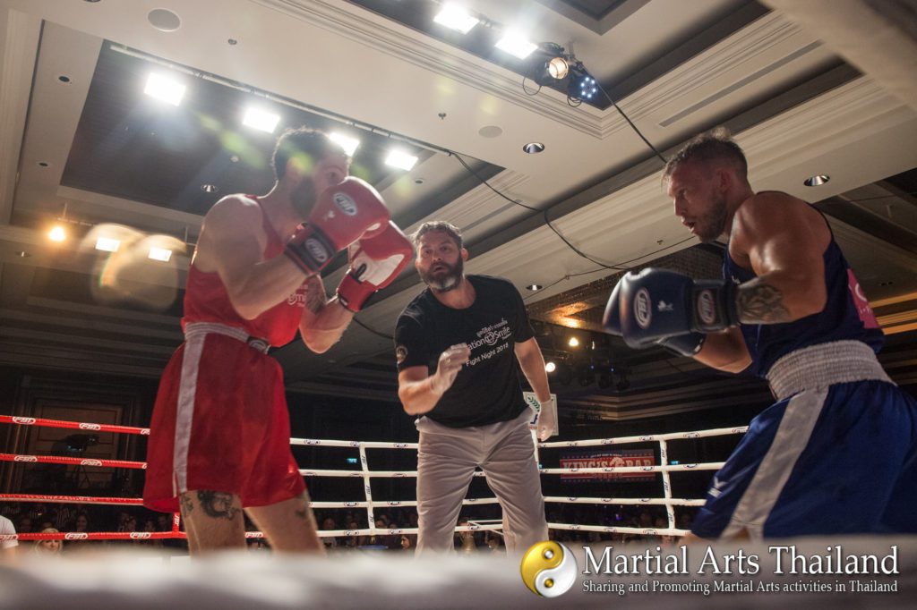 Jon Nutt refereeing the boxing match with TJ chang at at Operation Smile fight Night 2018 