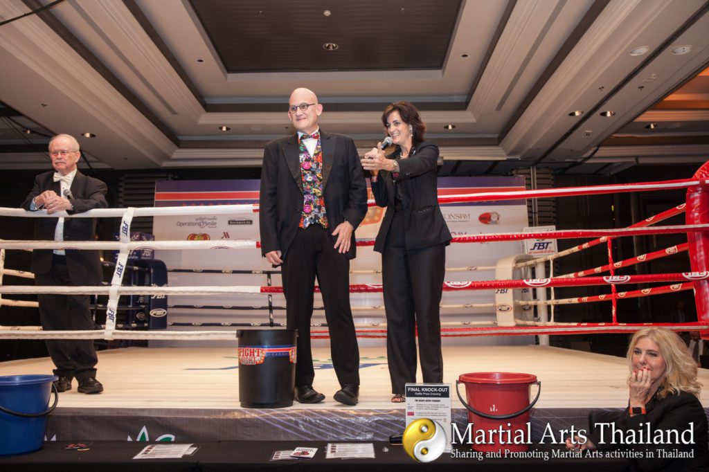 announcer and Therese Beauvais draft  at Operation Smile Fight Night 2018