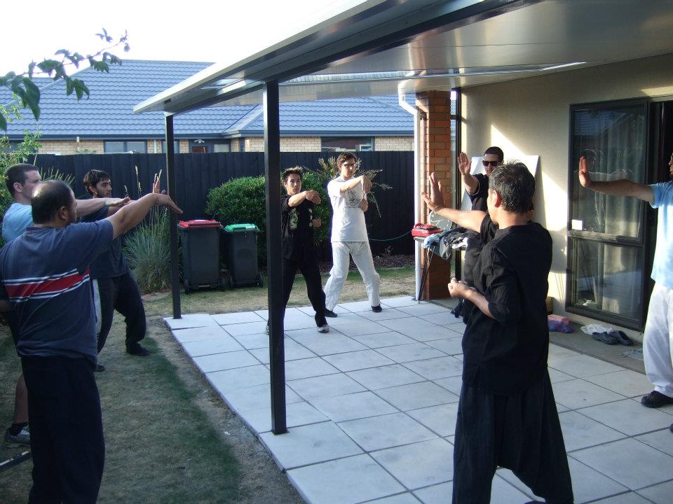 Students practicing in backyard  Wing Chung X