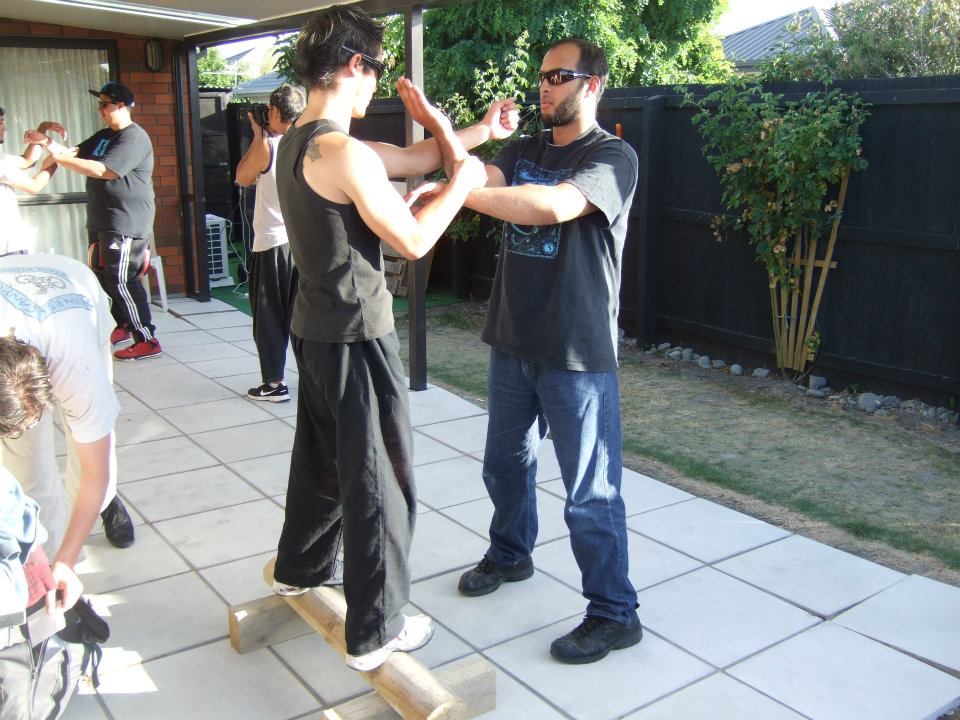Students practicing in backyard  Wing Chung X