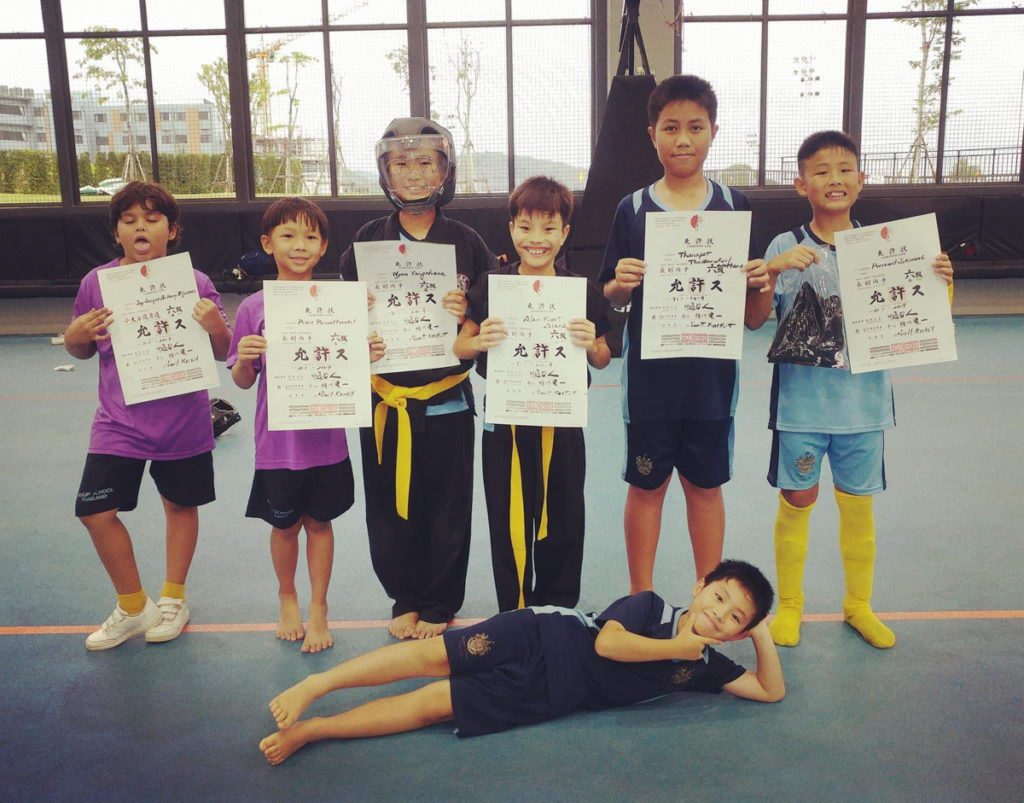 kids in class with diploma group photo Black Wing spochan sports chambara 