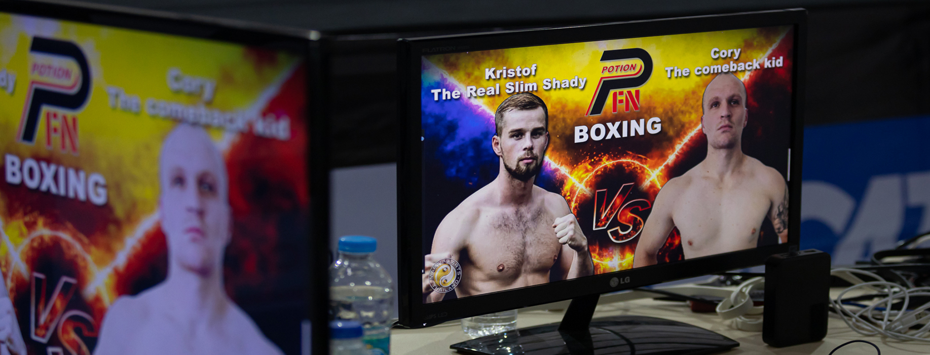 Graphics on screens with fighters information at Potion Fight Night by Martial Arts Thailand