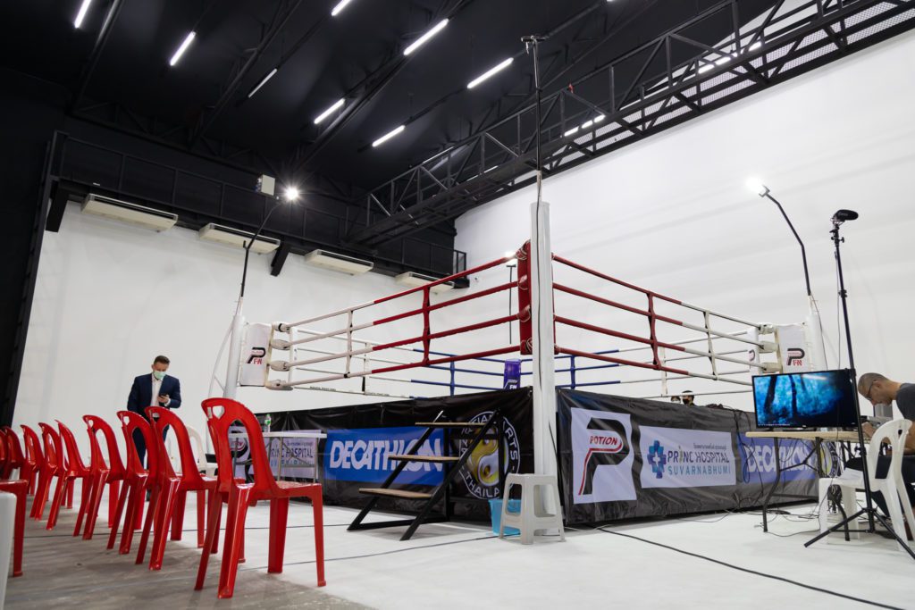 the boxing ring with sponsors logos setup in the production studio for Potion Fight Night by SEAFC