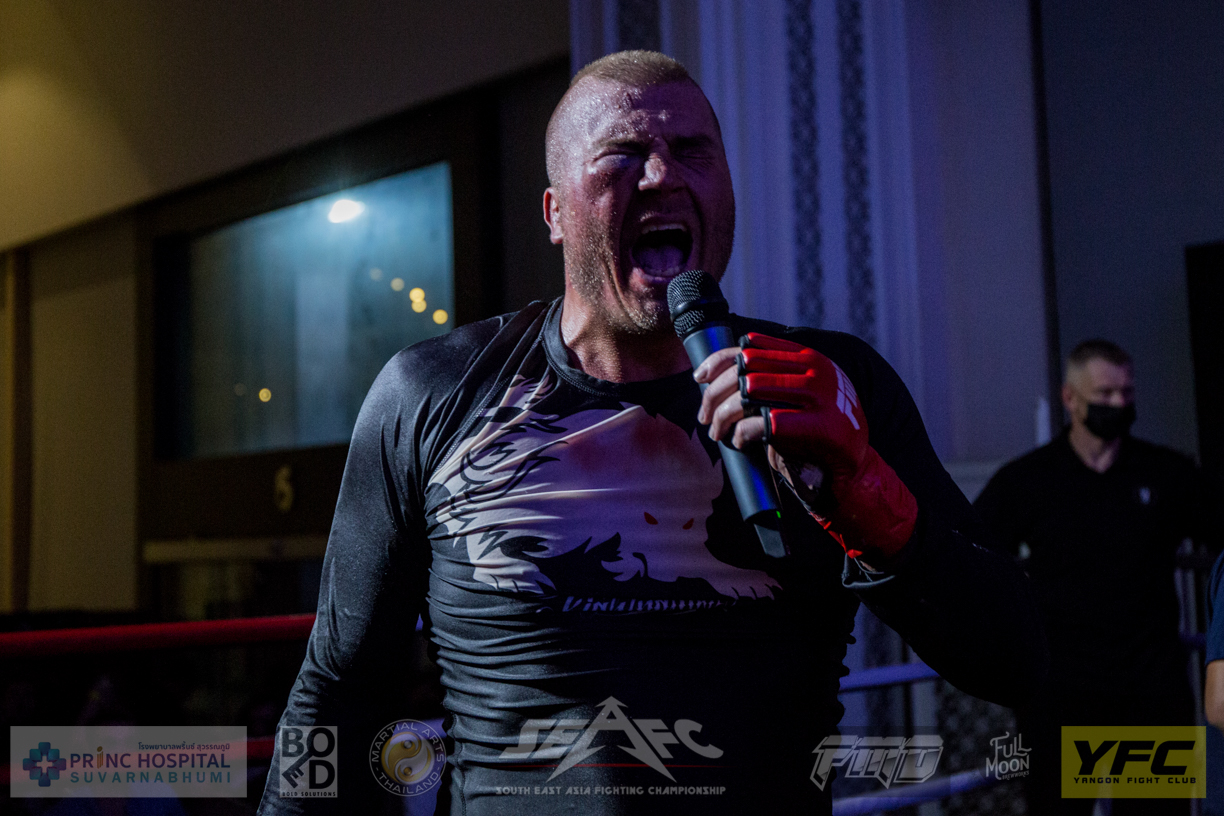 Daniel Dorrer screaming on the microphone after winning at the SEAFC 2 destroy everything