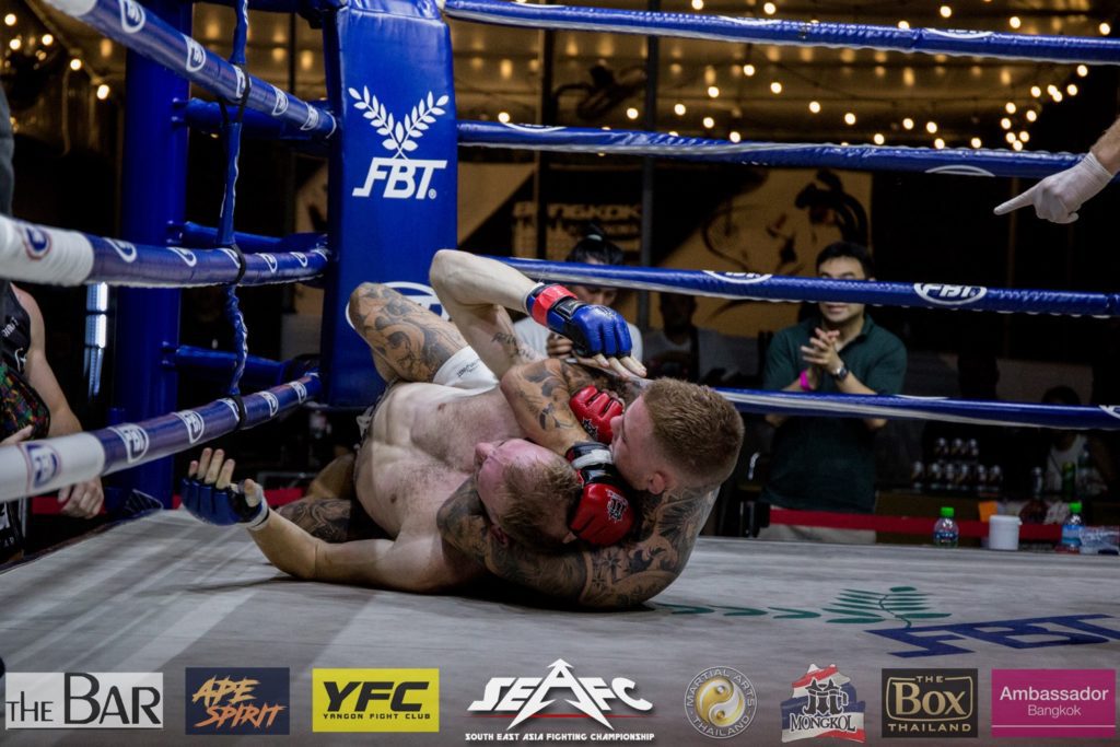 Oliver Axelsson finishing Jess Morgan with a rear naked choke at SEAFC 3