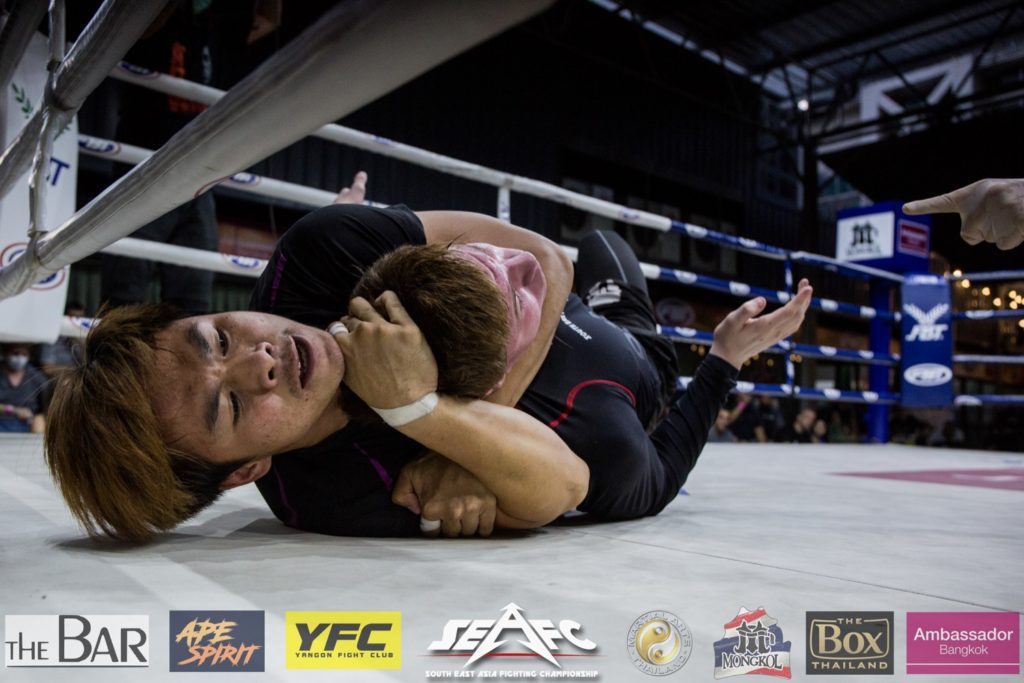 Ef Visarut performing a rear naked choke on Toby Mcnerlin during their grappling match at SEAFC 3